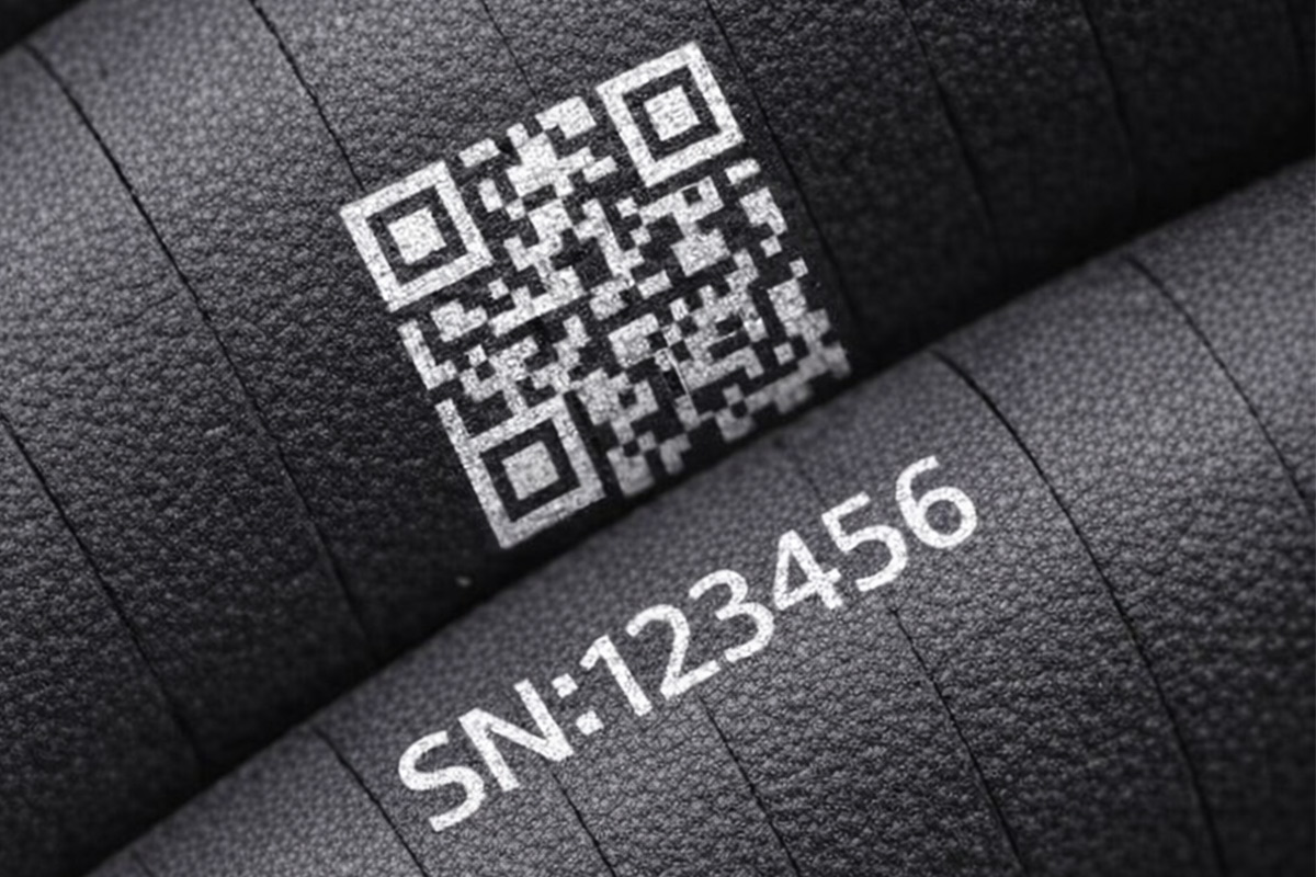 Close up of permanent vulcanized QR code label ensuring hydraulic hose traceability